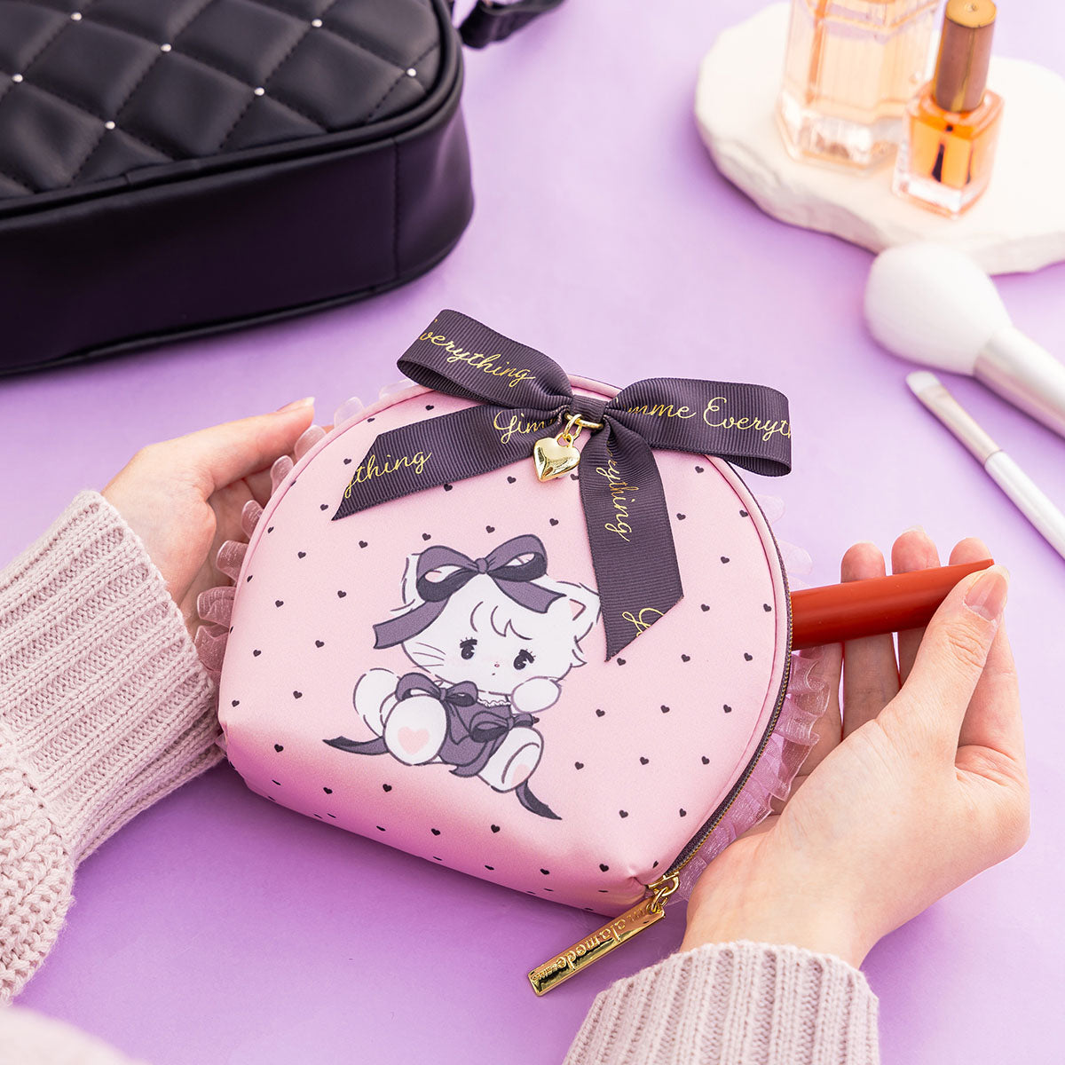 Lil ala mode リボン付きポーチ（ブラックスタイルムース）